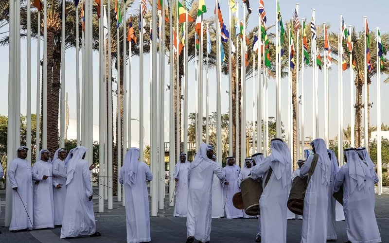 group-emirati-dancing-traditional-dance-wearing-traditional-clothes-expo-dubai-2020